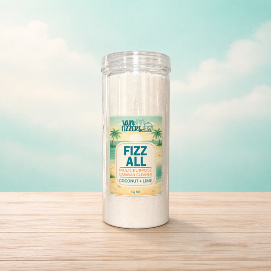 Jar of 'Fizz All' multi-purpose cleaning cubes with a coconut and lime scent on a wooden surface.