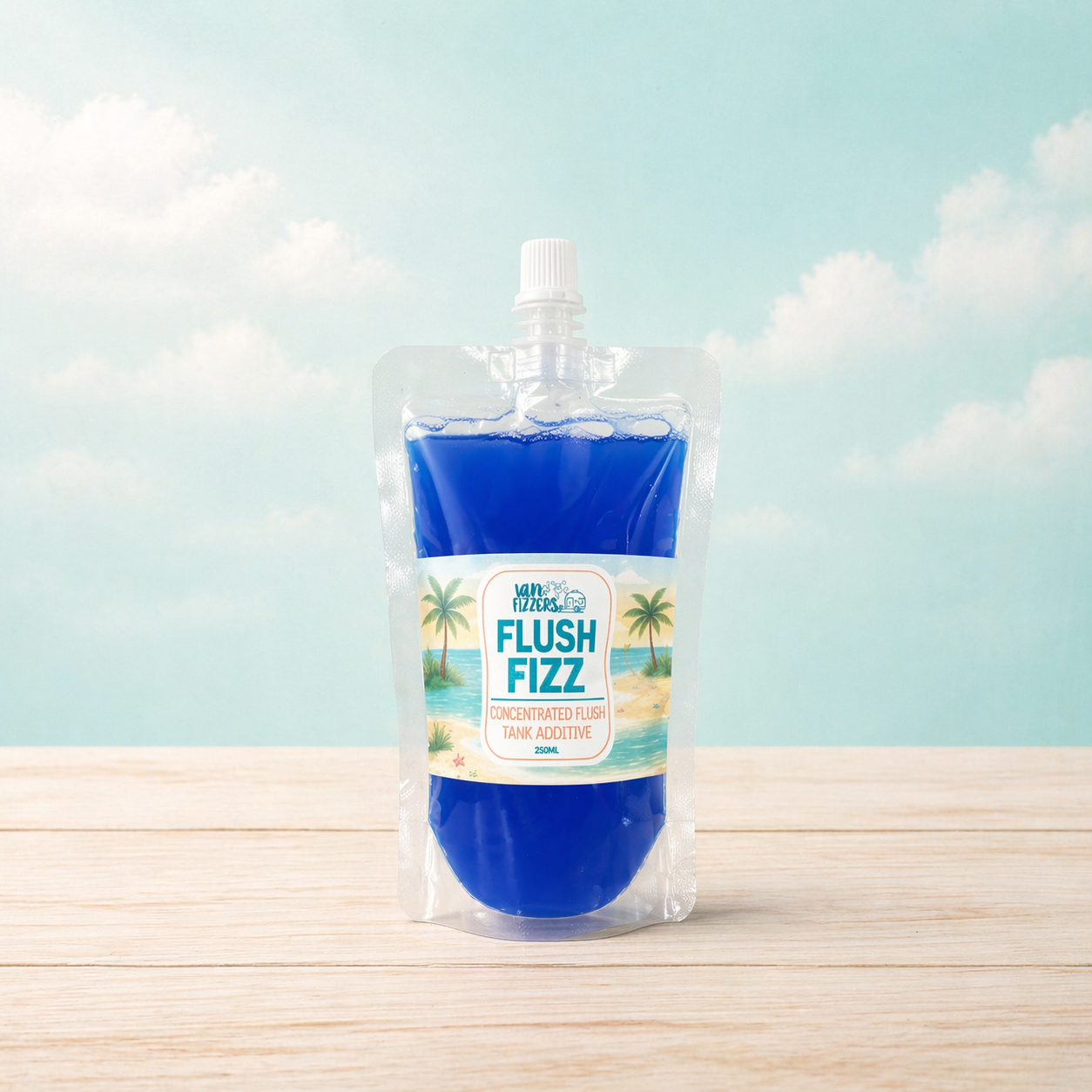 Blue pouch labeled 'Flush Fizz' on a wooden surface with a light blue background